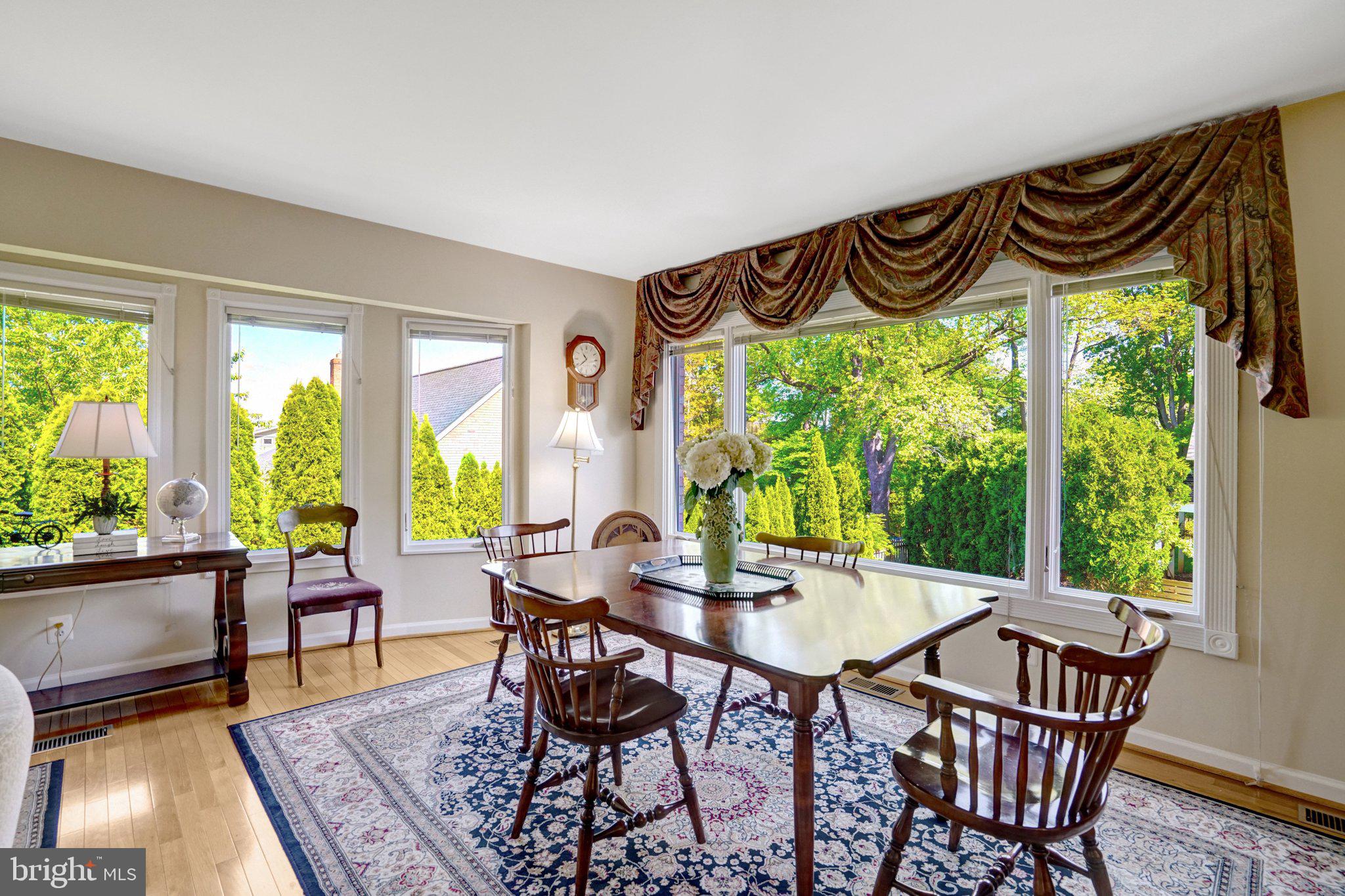 1812 A Birch Road McLean, VA 22101 - Photo 22 of 59 Sunlit dining space with garden views.