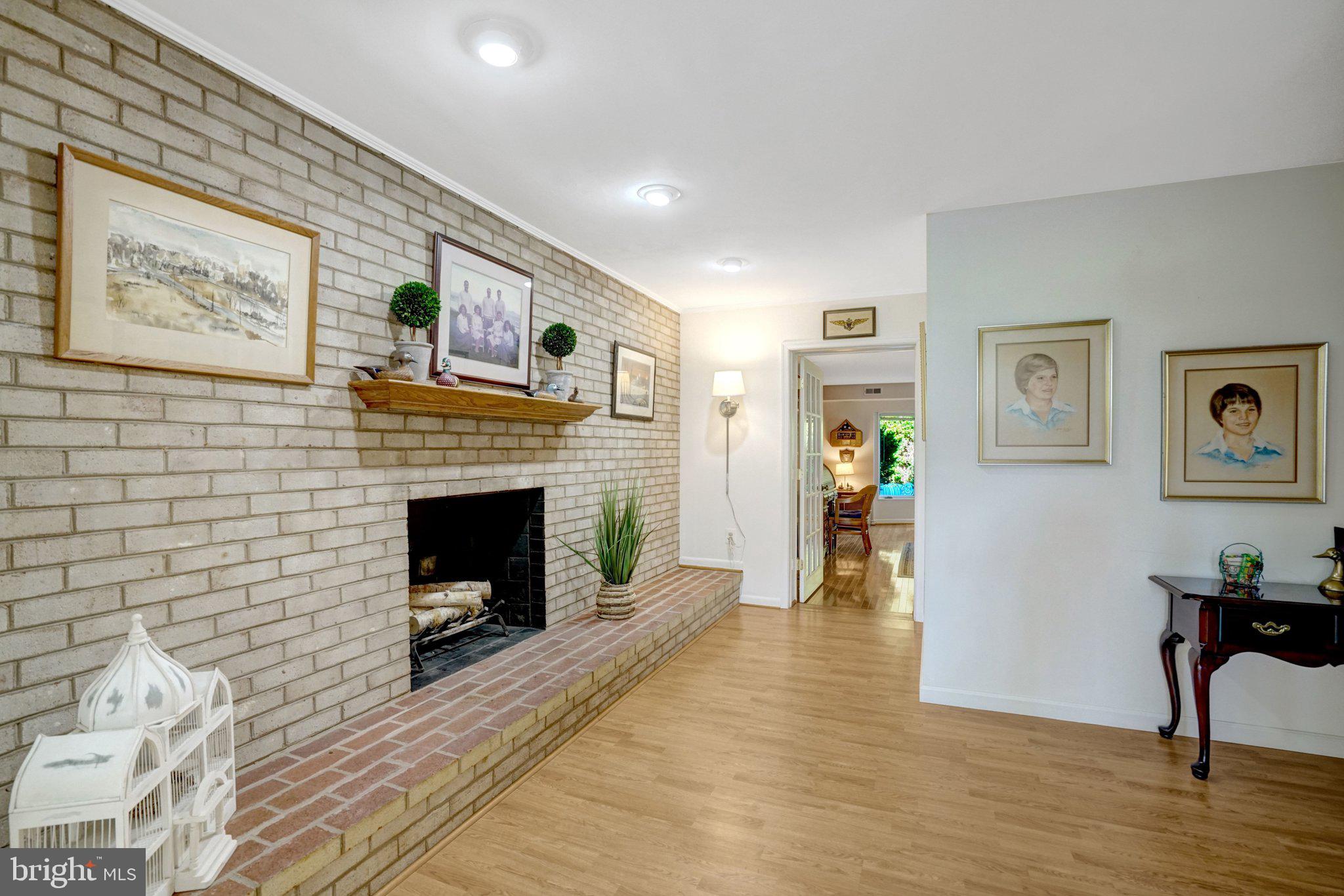 1812 A Birch Road McLean, VA 22101 - Photo 46 of 59 Charming brick fireplace with art accents.