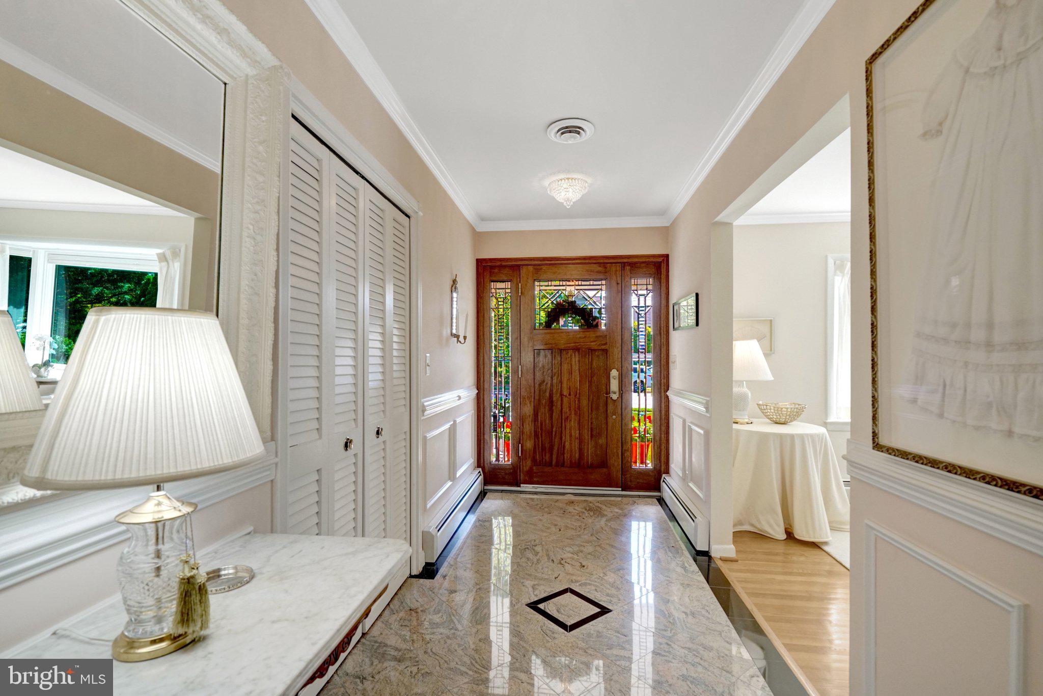 1812 A Birch Road McLean, VA 22101 - Photo 5 of 59 Elegant entryway with stained glass.