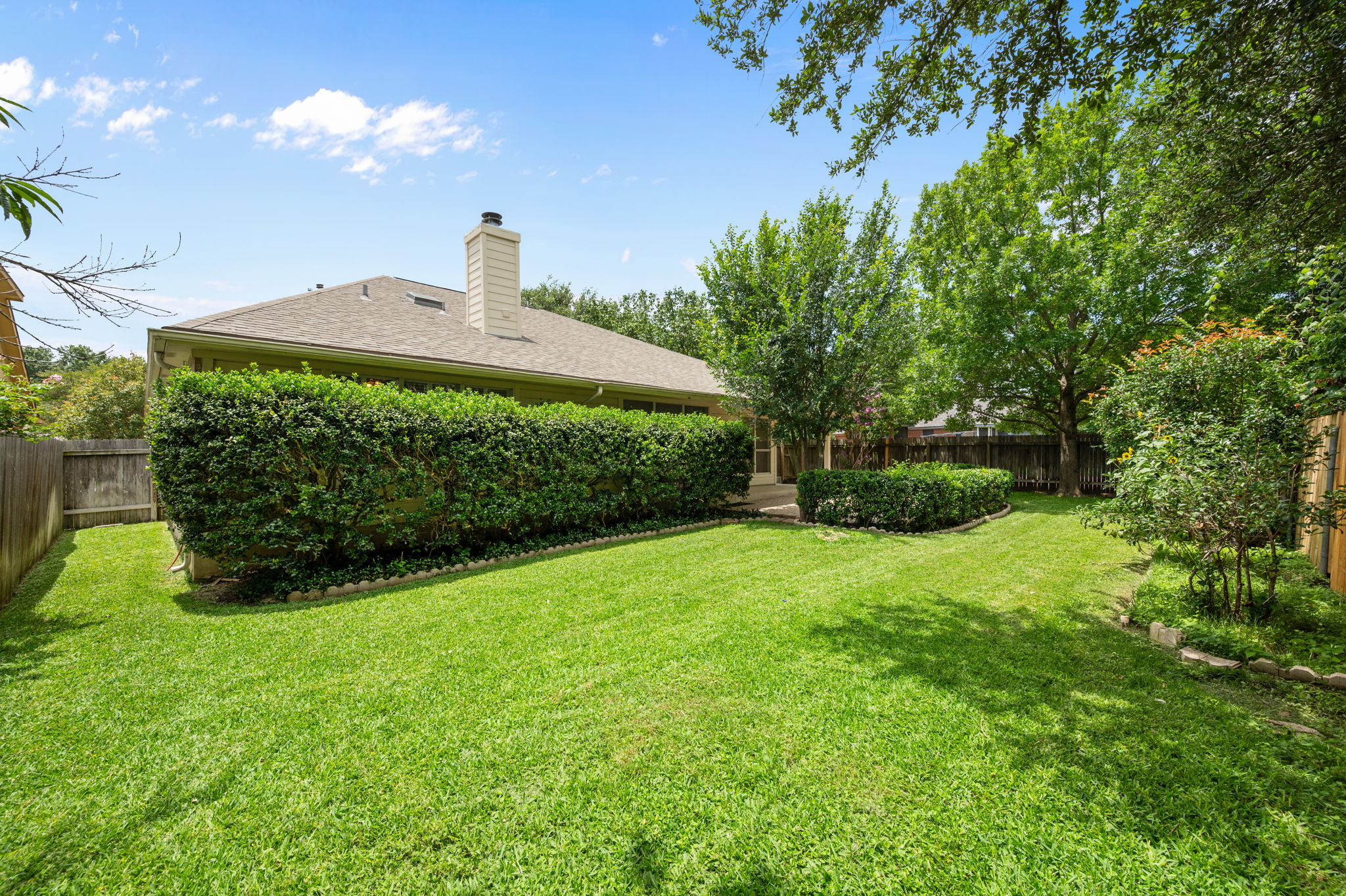 707 Ridge View Drive Leander, TX 78641 - Photo 37 of 40 a front view of a house with garden