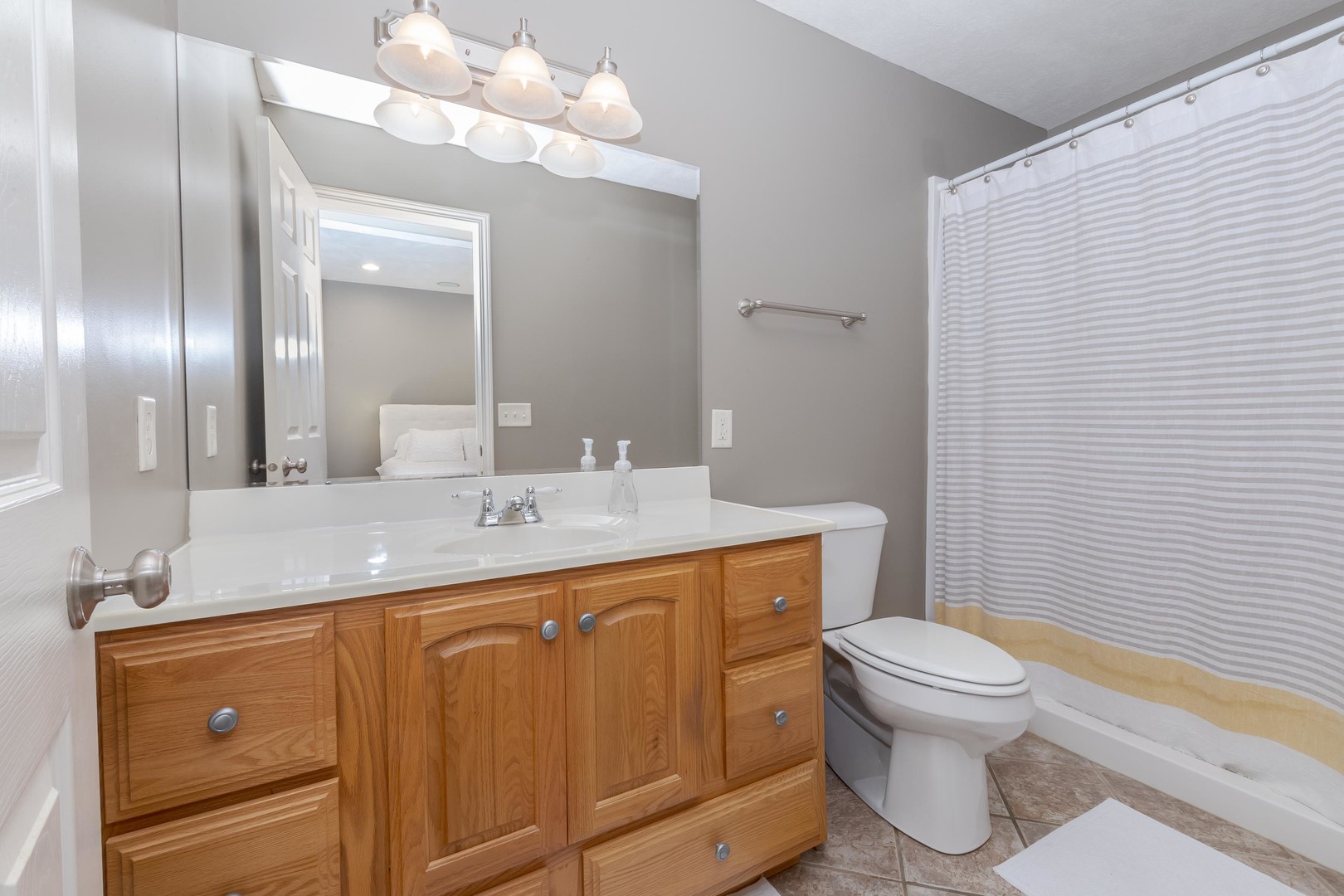 1223 Joy Walk Way Normal, IL 61761 - Photo 37 of 48 a bathroom with a sink a toilet and shower