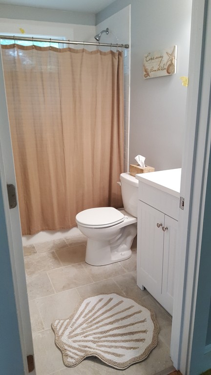 32 Puritan Road Bourne, MA 02532 - Photo 5 of 10 a bathroom with a sink and a toilet