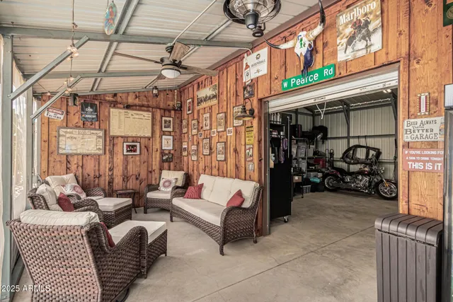 a view of a patio with table and chairs