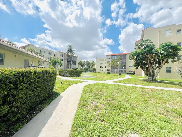 a view of building with yard