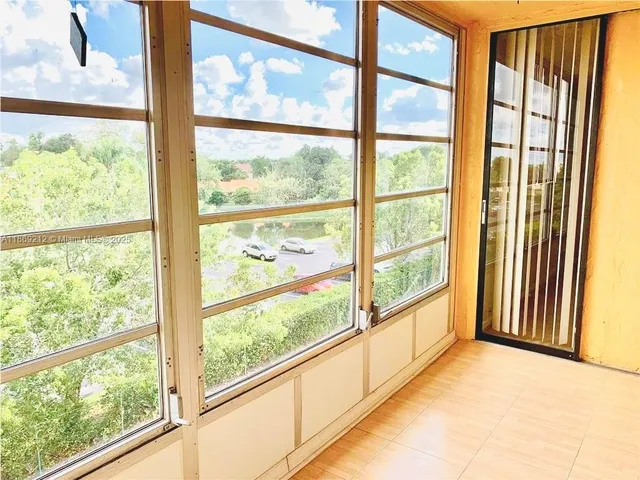a view of a large window with an outdoor view