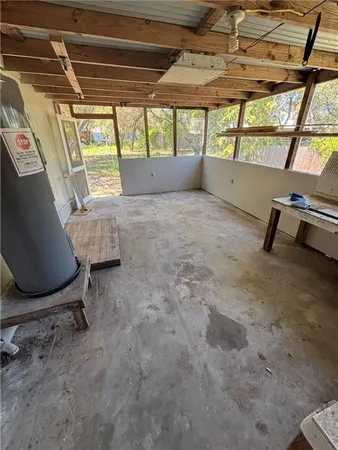 a view of room with window and a table