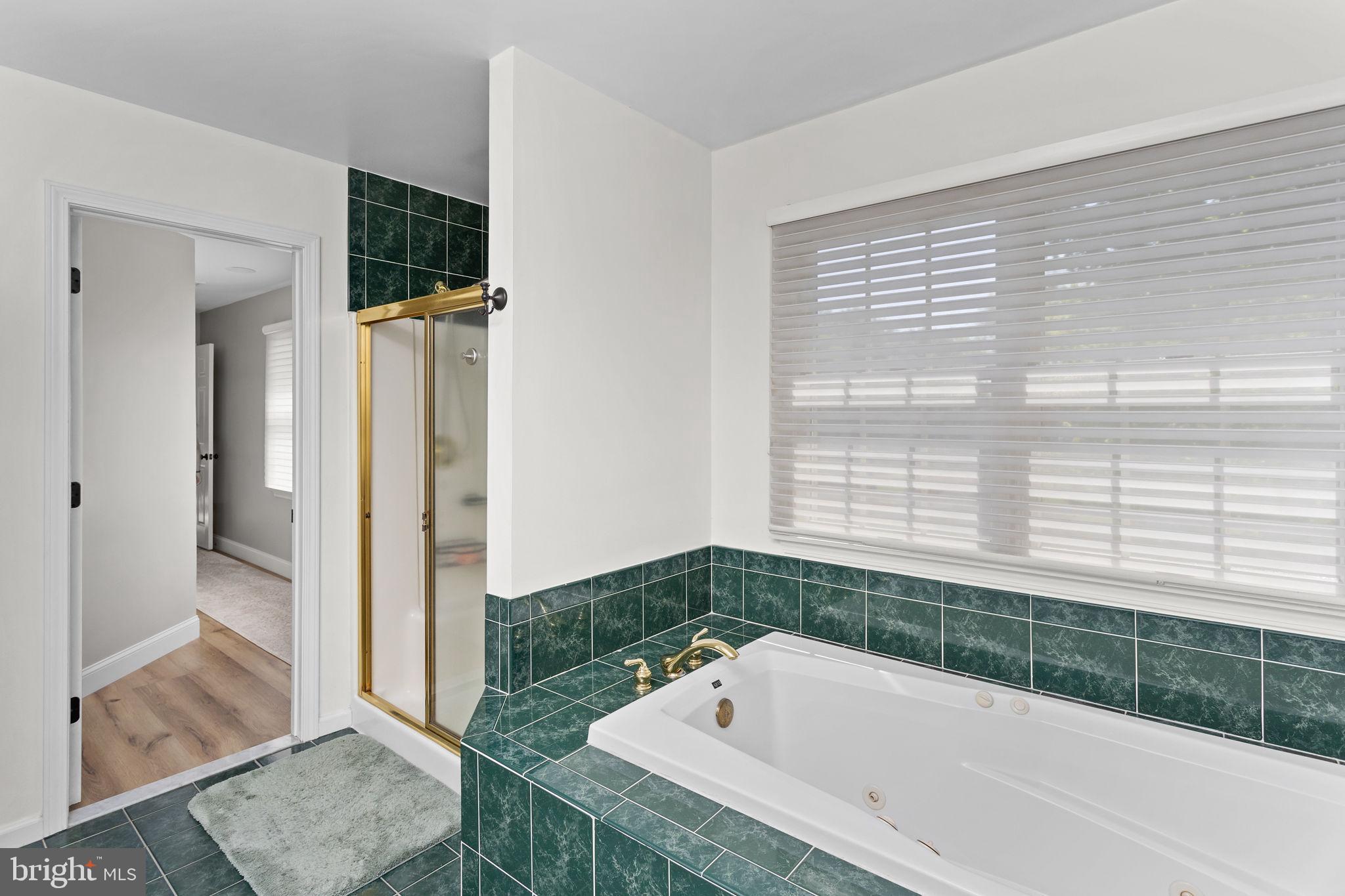 44 Walters Road Robbinsville, NJ 08691 - Photo 36 of 68 a bathroom with a tub shower and sink