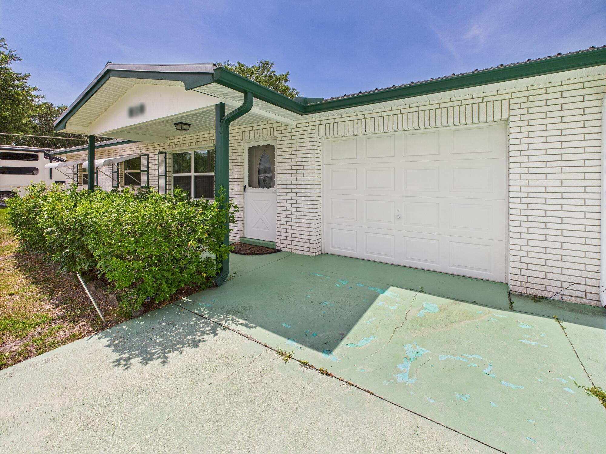 810 Southeast 13th Street Okeechobee, FL 34974 - Photo 5 of 41 CAM03600G0-PR0052-STILL028