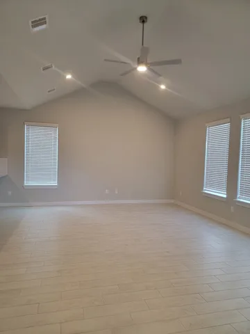 an empty room with windows