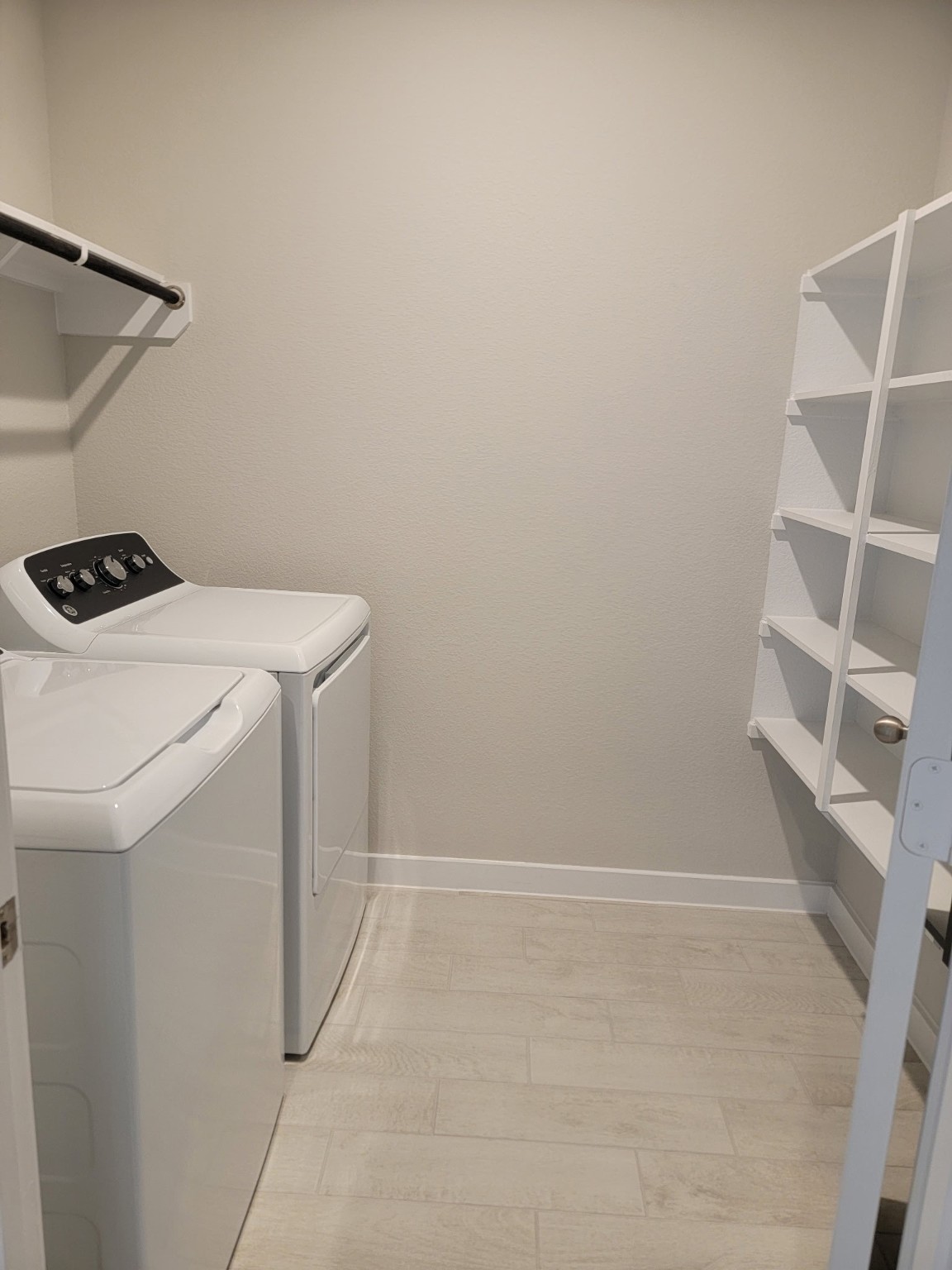 3130 Boulder Ridge Drive Rosenberg, TX 77471 - Photo 32 of 32 a utility room with dryer and washer