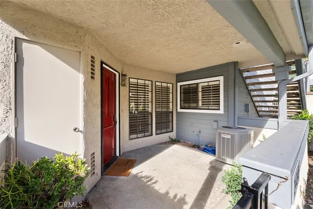 a backyard of a house with seating space