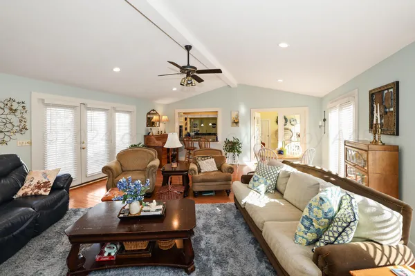 a bathroom with a sink mirror vanity and toilet