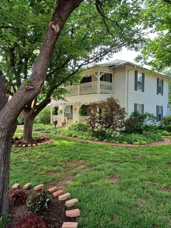 a view of a garden with pathway