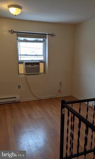 1201 South 13th Street, Unit A Philadelphia, PA 19147 - Photo 11 of 13 a view of a room with wooden floor and window