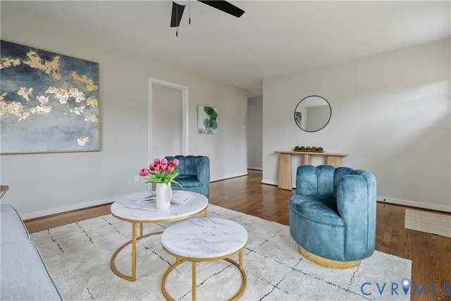 a living room with furniture and a table