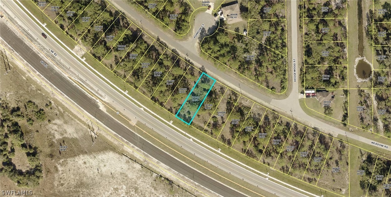 2528 Meadow Road Lehigh Acres, FL 33974 - Photo 3 of 3 a city view from a balcony