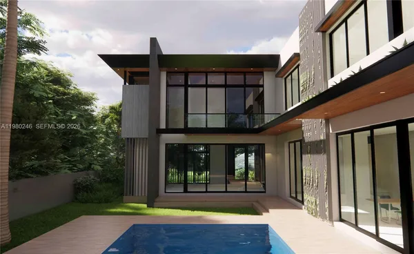 a view of front door of house with yard