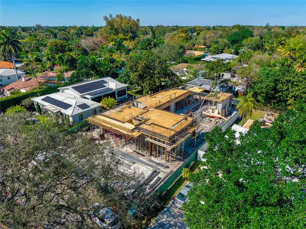 an aerial view of a house with a garden