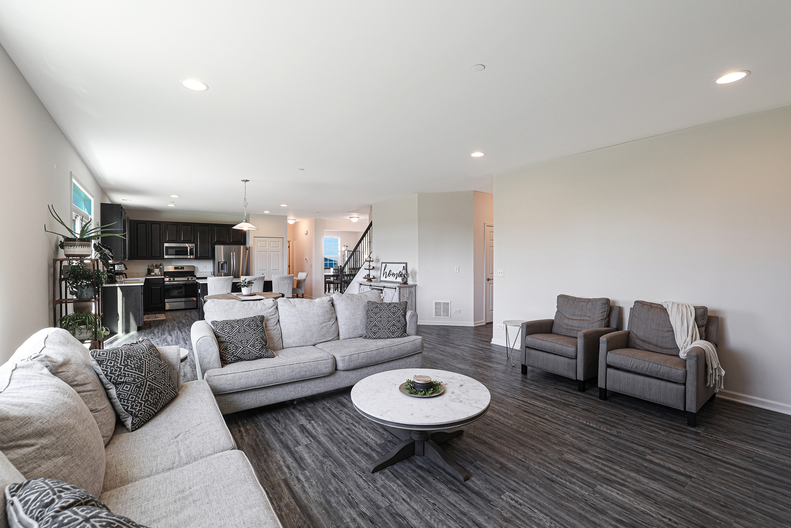 5835 Fairview Lane Hoffman Estates, IL 60192 - Photo 11 of 33 a living room with furniture and a wooden floor