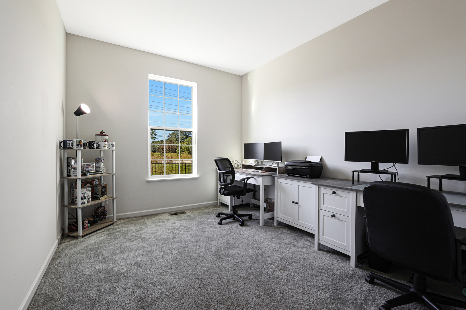 5835 Fairview Lane Hoffman Estates, IL 60192 - Photo 14 of 33 a view of a workspace with furniture and a window