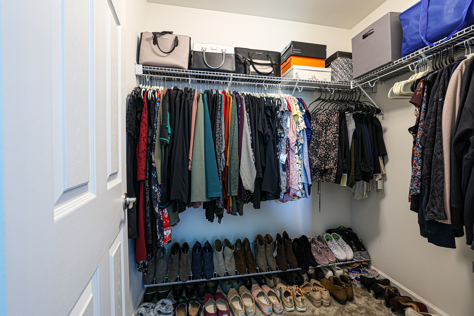 5835 Fairview Lane Hoffman Estates, IL 60192 - Photo 25 of 33 a view of walk in closet with clothes and shoes