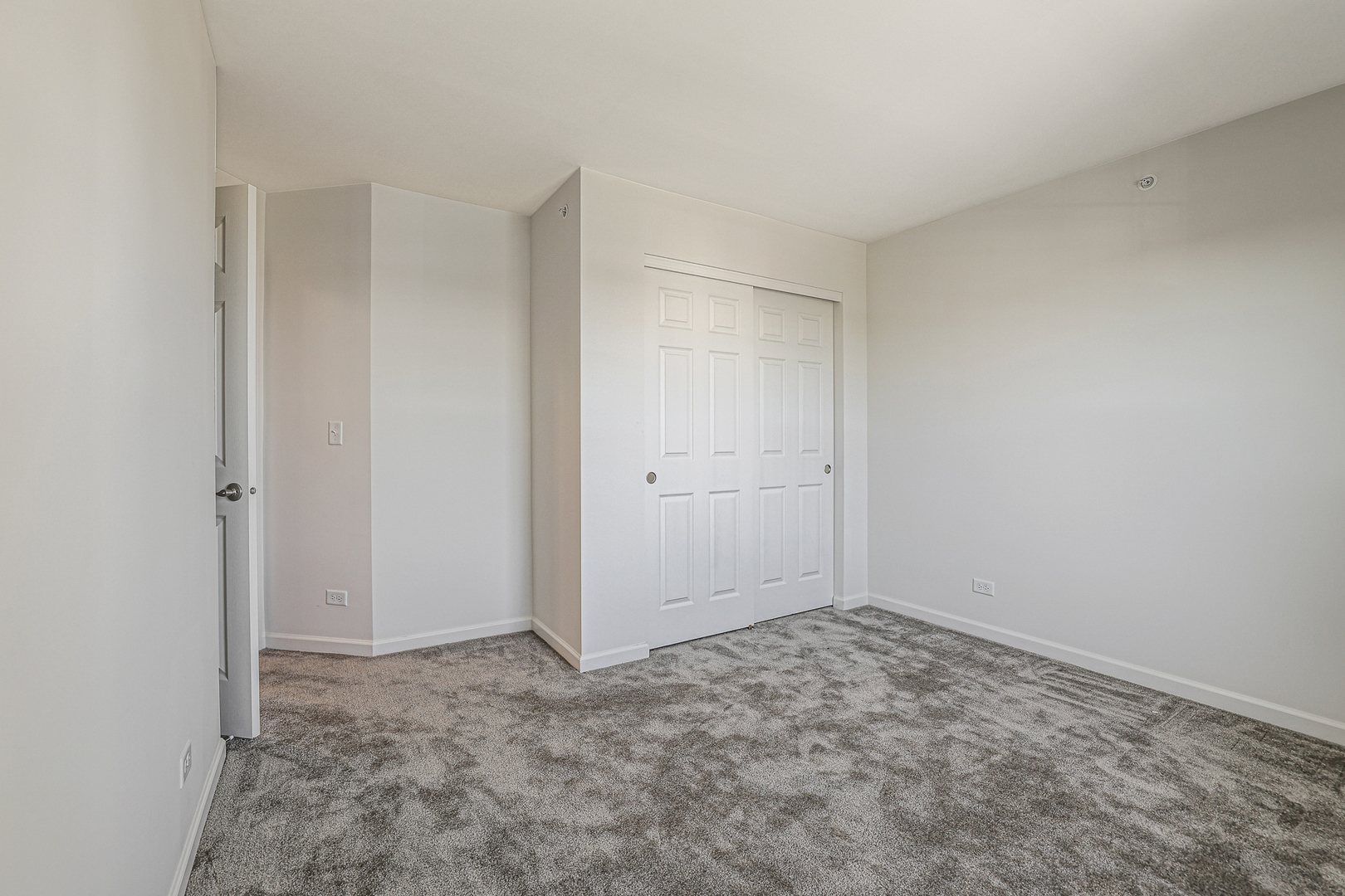 5835 Fairview Lane Hoffman Estates, IL 60192 - Photo 27 of 33 an empty room with a natural light