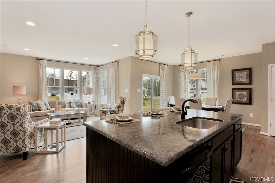 12918 Deep Wl Road Midlothian, VA 23112 - Photo 11 of 50 a kitchen with counter space a sink and living room view