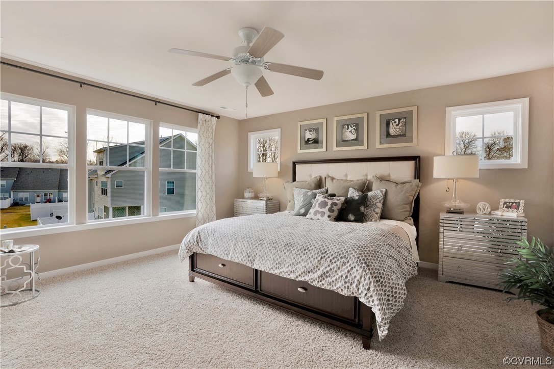 12918 Deep Wl Road Midlothian, VA 23112 - Photo 20 of 50 a bedroom with a large bed and a window