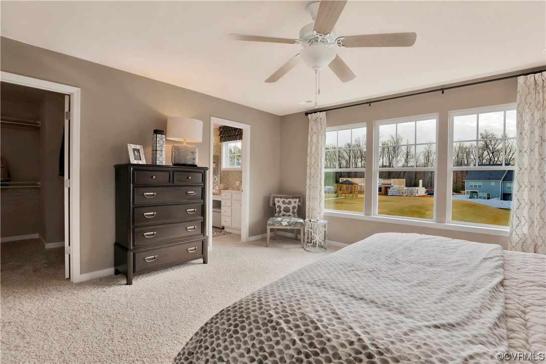 12918 Deep Wl Road Midlothian, VA 23112 - Photo 21 of 50 a bed room with a bed and a large window