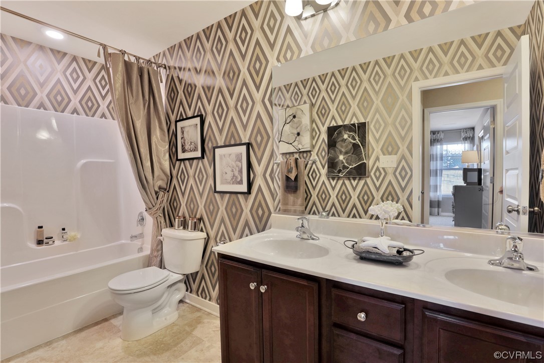 12918 Deep Wl Road Midlothian, VA 23112 - Photo 25 of 50 a bathroom with a granite countertop sink a toilet and a bathtub