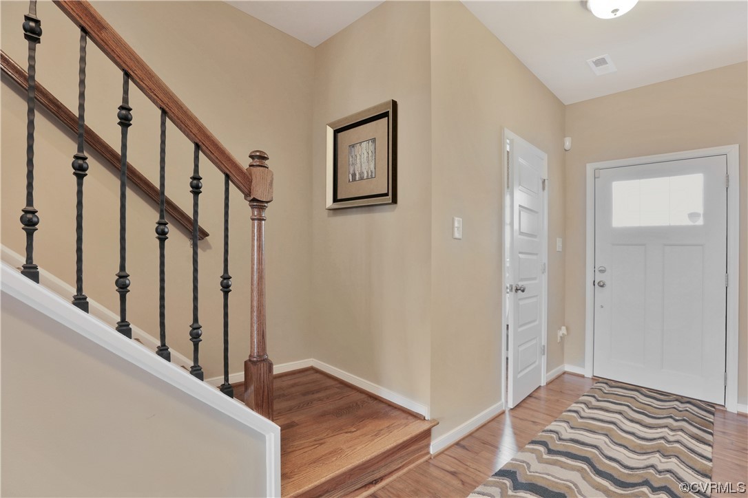 12918 Deep Wl Road Midlothian, VA 23112 - Photo 3 of 50 a view of an entryway with wooden floor