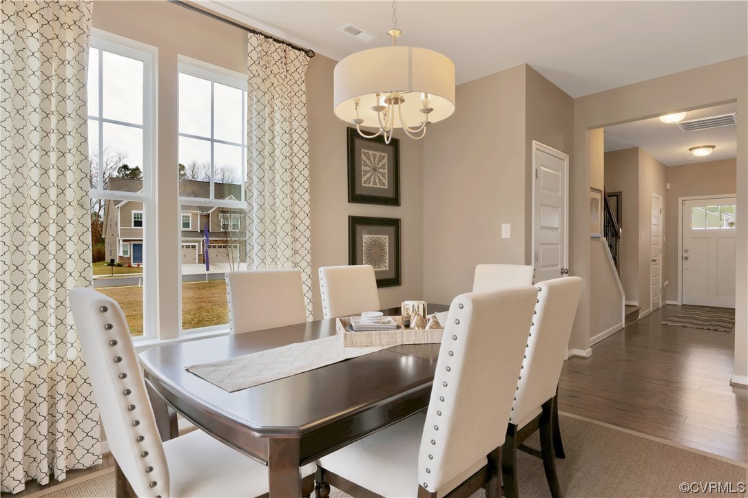 12918 Deep Wl Road Midlothian, VA 23112 - Photo 5 of 50 a dining room with furniture and wooden floor