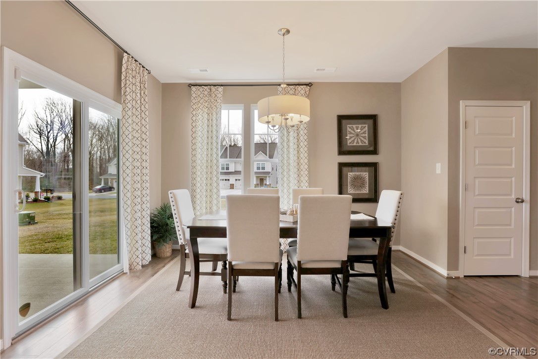12918 Deep Wl Road Midlothian, VA 23112 - Photo 7 of 50 a view of a dining room with furniture window and outside view