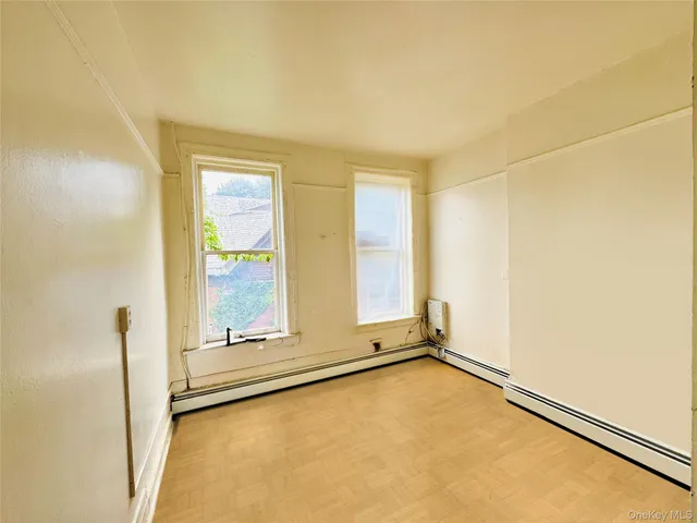 a view of an empty room and window