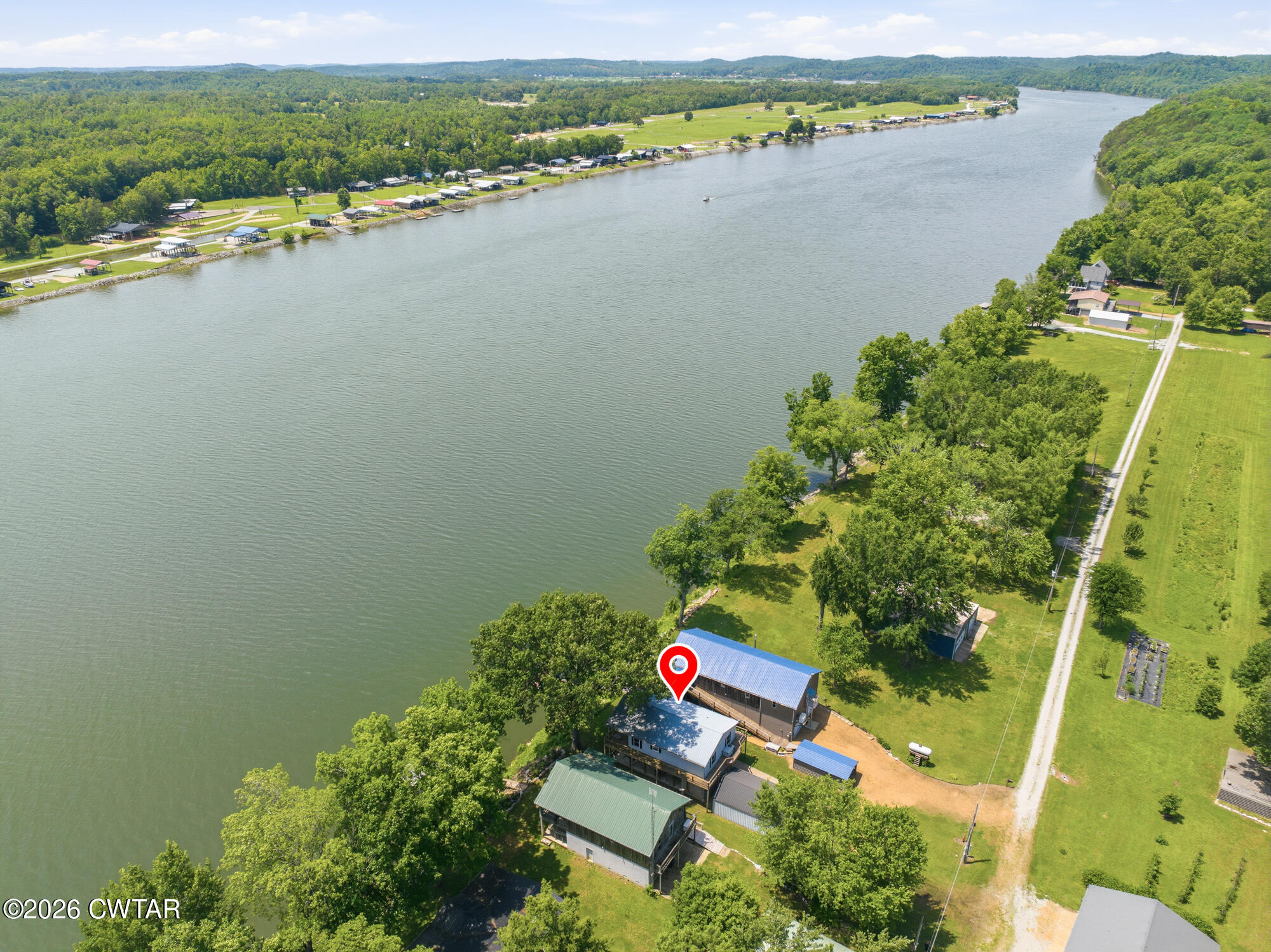 1728 Yarbro Landing Lane Decaturville, TN 38329 - Photo 35 of 44 an aerial view of a city and lake view