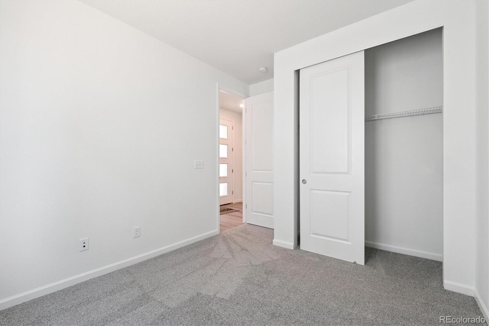 8317 Eagle River Street Littleton, CO 80125 - Photo 13 of 18 an empty room with closet