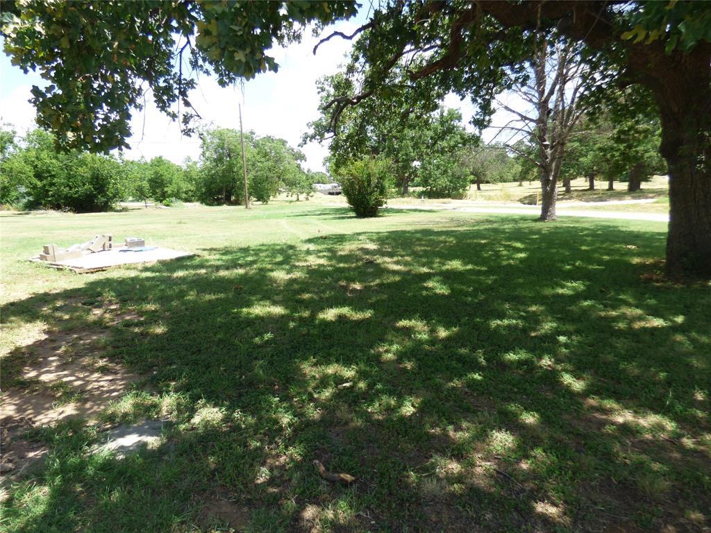 309 East 10th Street Cisco, TX 76437 - Photo 11 of 35 shaded yard