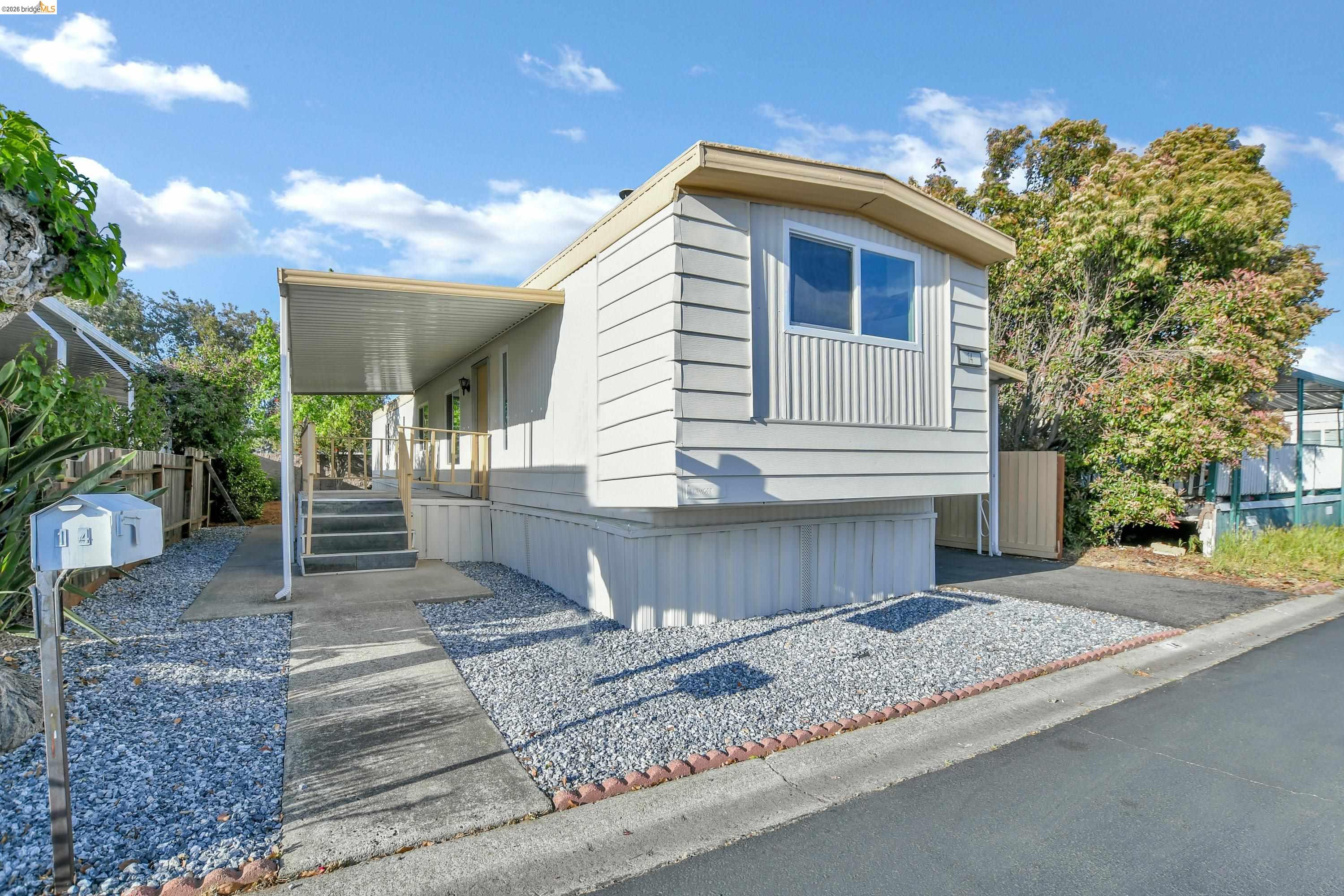 14 Del Rio Pittsburg, CA 94565 - Photo 1 of 25 Front exterior with fresh paint and low maintenance landscaping