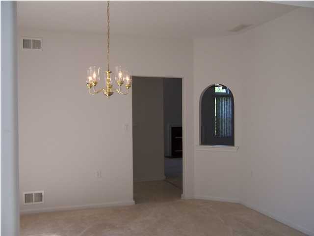 59 Drayton Road Manchester Township, NJ 08759 - Photo 2 of 3 a view of a chandelier in a room