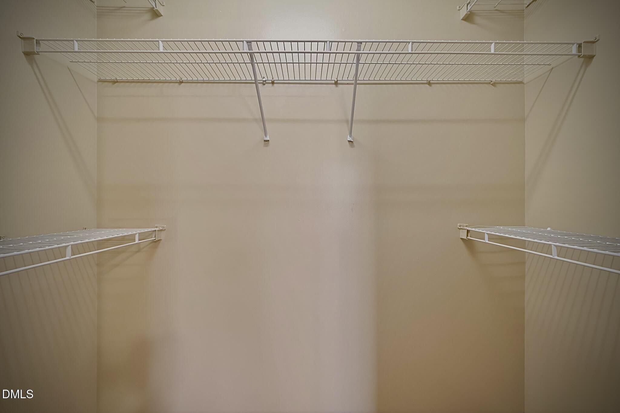 5415 Gunnette Drive Raleigh, NC 27610 - Photo 12 of 37 a view of a room with racks on the wall
