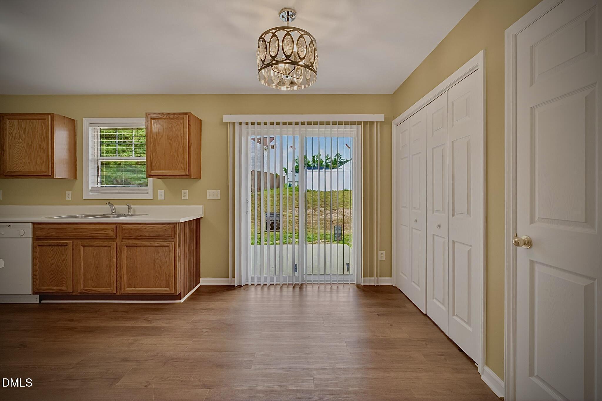 5415 Gunnette Drive Raleigh, NC 27610 - Photo 26 of 37 a view of a kitchen with a sink and a window
