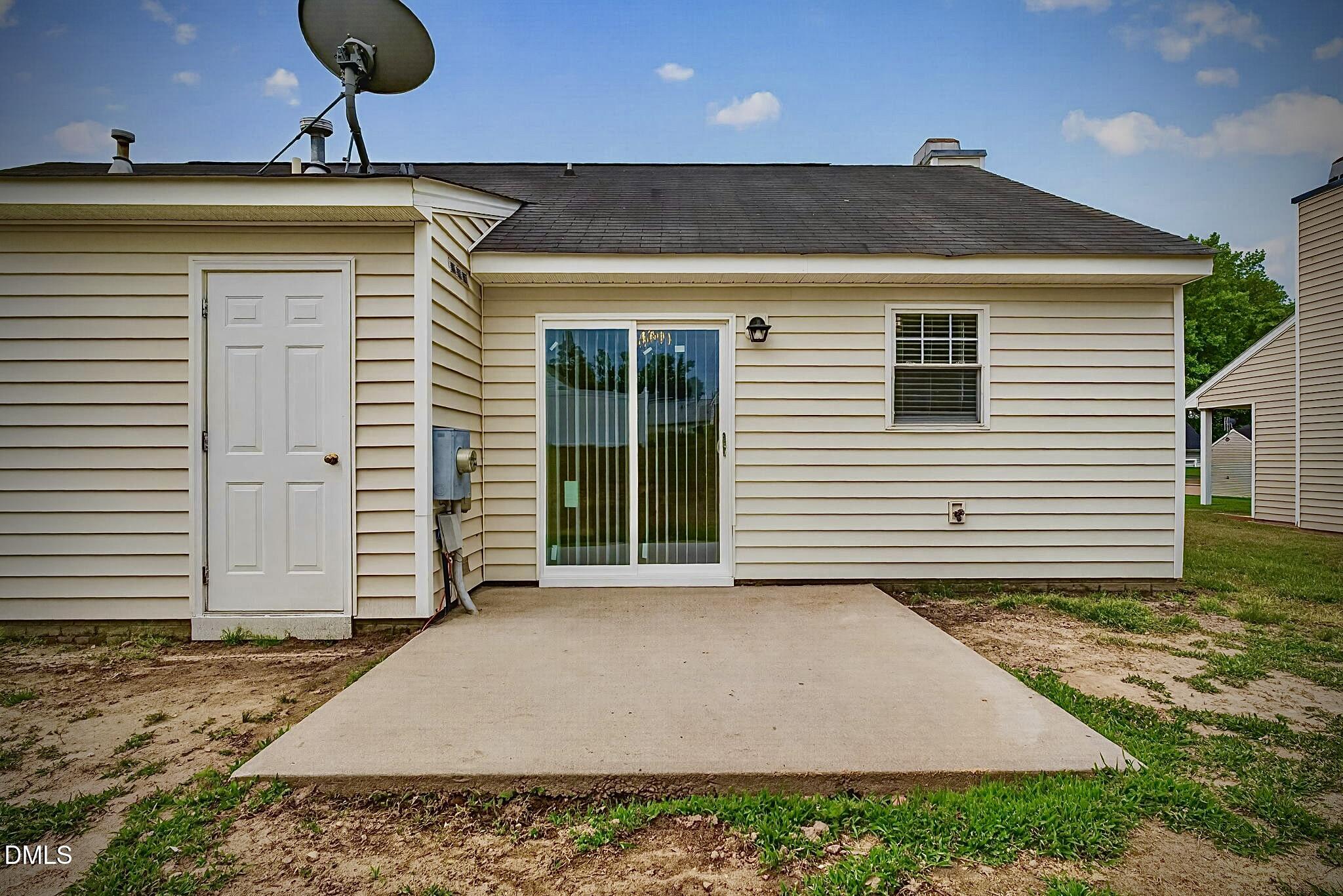 5415 Gunnette Drive Raleigh, NC 27610 - Photo 33 of 37 a front view of a house with a yard