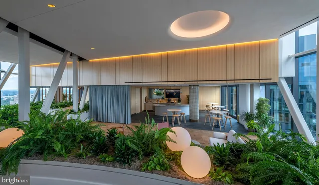 a view of a building with sitting area