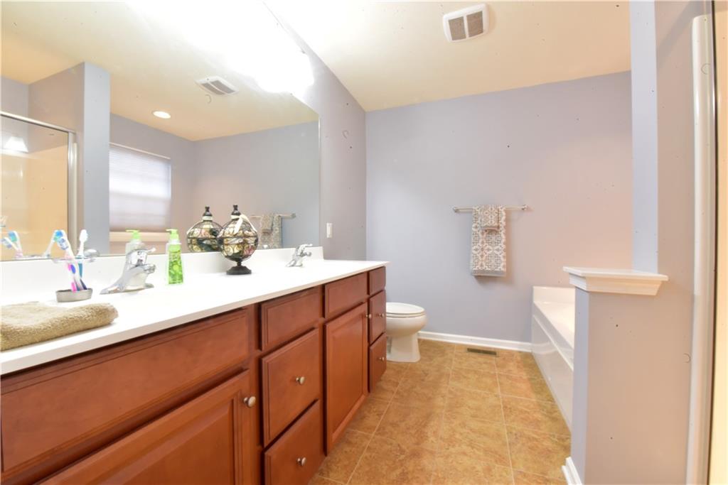 405 Maple Ridge Drive Canonsburg, PA 15317 - Photo 14 of 21 Master Bathroom Double Bowl sink Walk-in Shower and Soaker Tub.