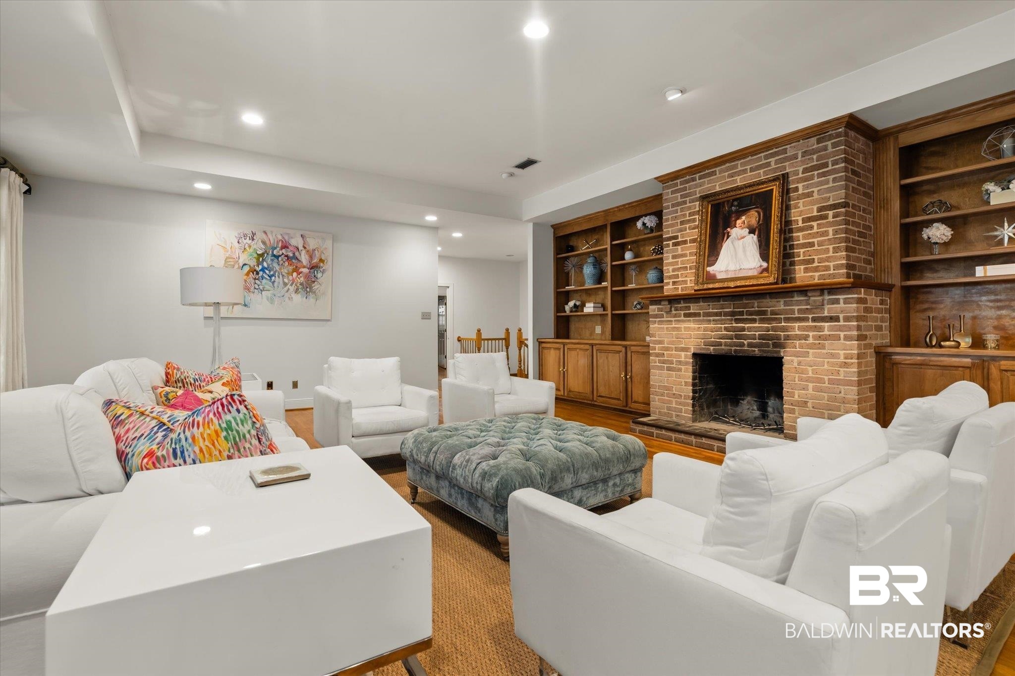 143 Myrtlewood Lane Mobile, AL 36608 - Photo 18 of 55 Living area with visible vents, built in features, wood finished floors, recessed lighting, and a brick fireplace