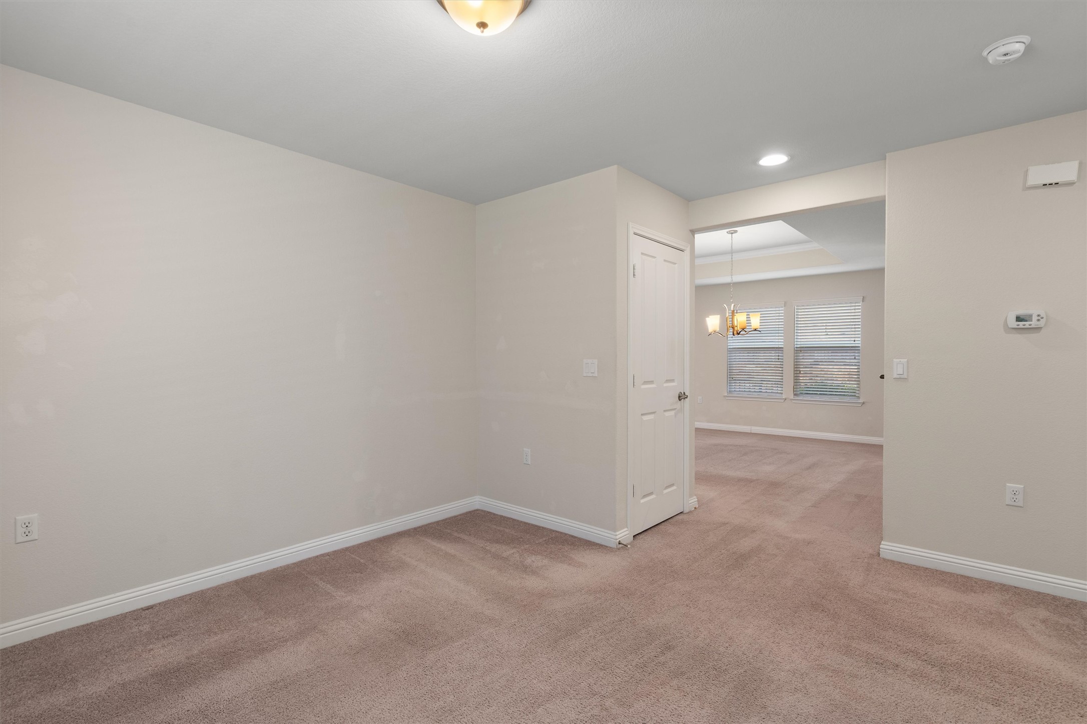 307 Kickapoo Creek Lane Georgetown, TX 78633 - Photo 19 of 30 Soft carpeting underfoot defines this versatile space flowing seamlessly into the adjacent living area.