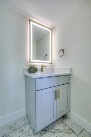 a view of a hallway to room with window
