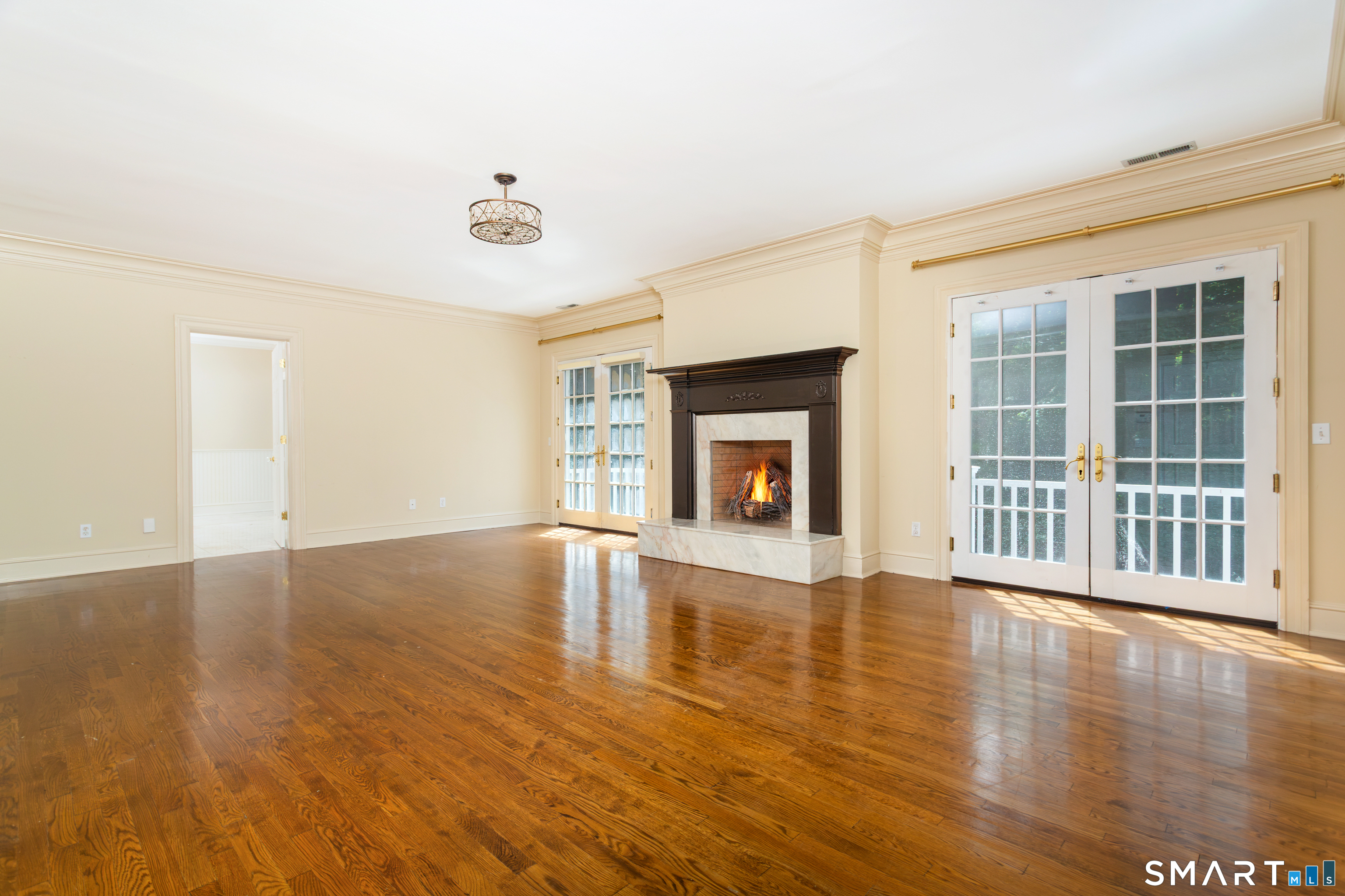 7 Old Hyde Road Weston, CT 06883 - Photo 20 of 40 Primary Bedroom with French Doors to Balcony