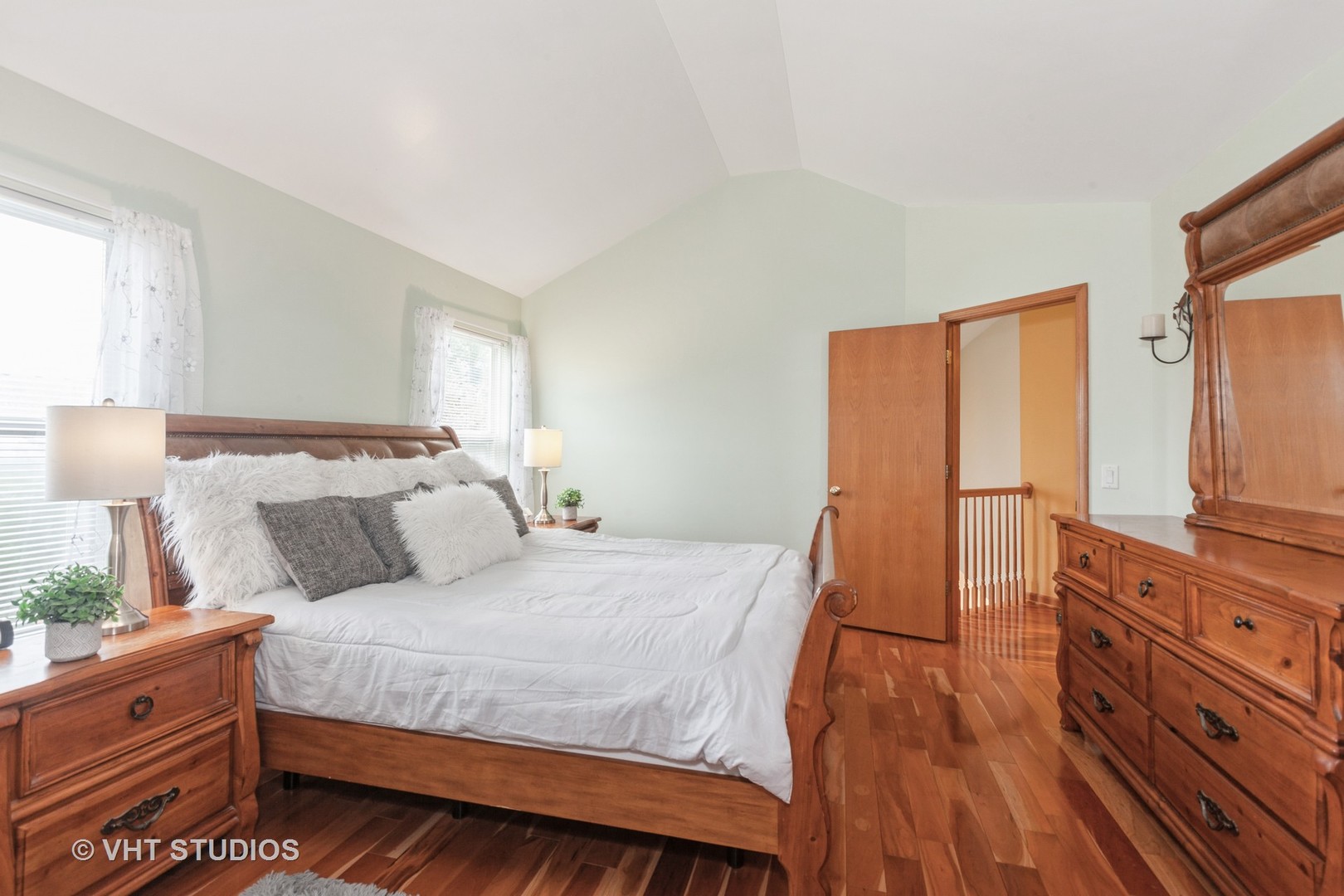 2578 Crestview Drive Aurora, IL 60502 - Photo 13 of 43 a bedroom with a bed and wooden floor