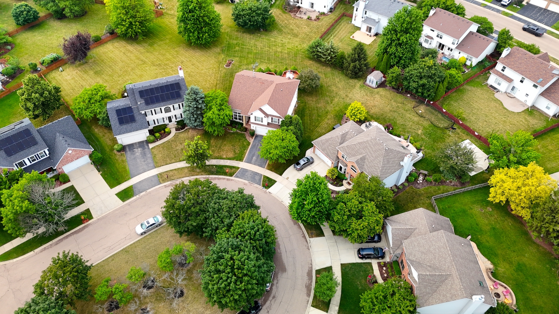 2578 Crestview Drive Aurora, IL 60502 - Photo 29 of 43 an aerial view of a house with a garden and swimming pool